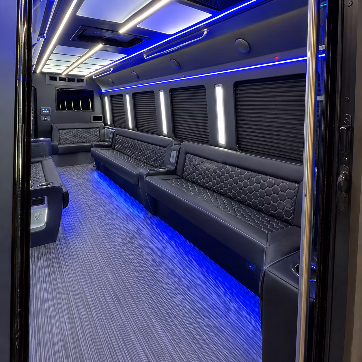 Group beside a Mercedes Sprinter limo in Norfolk